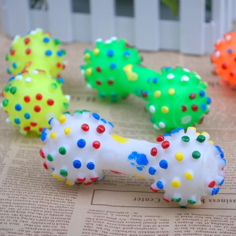 kleurrijk gestippeld haltervormig piepend speelgoed