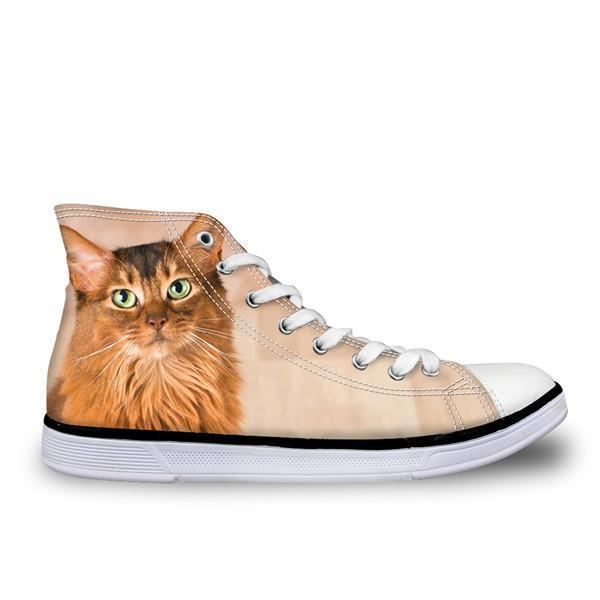 stijlvolle hoge damesschoenen van canvas met glimmende katten