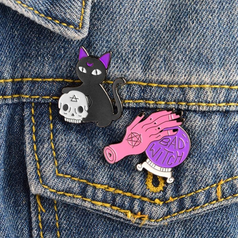 zwarte kat schedel hoofd pin broche